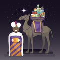 Three kings day with King Balthazar, camel and gifts at night