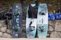 Three kitesurfing boards leaning against the wall Royalty Free Stock Photo