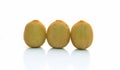 Three kiwifruit on white background