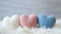 Three Knitted Hearts on Fluffy White Surface Royalty Free Stock Photo