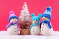 Three knitted snowmen