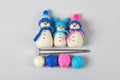 Three knitted snowmen