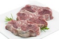 Three lamb chops on a white plate Royalty Free Stock Photo