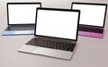 Three laptops with different colors and flat white screen. Royalty Free Stock Photo
