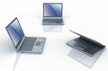 Three laptops over white background