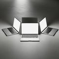 Three laptops in a triangle formation Royalty Free Stock Photo