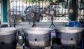 Three large Pans are fried the fried chicken with large three fan behind them. This is the street food Fried chicken booth at the Royalty Free Stock Photo