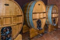 Three large wine vats with spigot Royalty Free Stock Photo