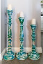 Three large wooden painted retro candlesticks