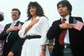 Three Latinos recite the Pledge of Allegiance at induction ceremony, East Los Angeles, California