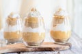 Three Layered Pumpkin Trifle with Whipped Cream and Cookie Crumbs