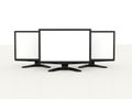 Three LCD monitors with white screen Royalty Free Stock Photo