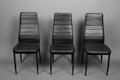 Three Leather Chairs With Modern Design Aligned