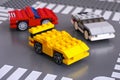 Three Lego custom made cars on Lego road baseplate