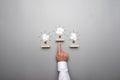 Three light bulb formed by white puzzle pieces placed on wooden Royalty Free Stock Photo