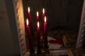 Three lighted red candles Royalty Free Stock Photo