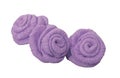 Three lilac decorative rose flowers on a white background isolated. Craft from polymer clay.