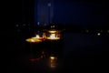 Three lit candles create a romantic atmosphere Royalty Free Stock Photo