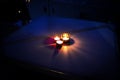 Three lit candles create a romantic atmosphere Royalty Free Stock Photo