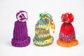 Three little bobble hats Royalty Free Stock Photo