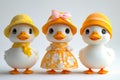 Three little ducks in yellow hats and dresses Royalty Free Stock Photo