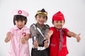 Three little girl in different profession uniform