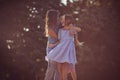 Three little girl spending time in nature. Two little girls hugging Best friends Royalty Free Stock Photo