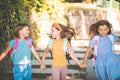 Three little girls going to school Royalty Free Stock Photo