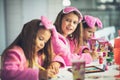 Three little girls having a party at home. Royalty Free Stock Photo