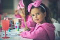 Three little girls having a party at home. Royalty Free Stock Photo