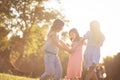 Little girls playing in nature and holding hands Royalty Free Stock Photo