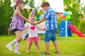 Three little kids dancing roundelay Royalty Free Stock Photo