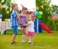 Three little kids dancing roundelay Royalty Free Stock Photo