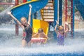 Three little kids playing in the swimming pool Royalty Free Stock Photo