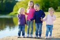 Three little sisters and their brother having fun Royalty Free Stock Photo
