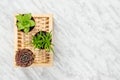 Three little succulent plants on marble background