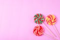 Three lollipops on pink Royalty Free Stock Photo