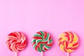 Three lollipops on pink Royalty Free Stock Photo