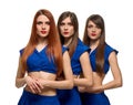 Three long-haired women portrait. triplets sisters Royalty Free Stock Photo