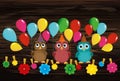 Three lovely owls sit on a rope and hold balloons. Hanging on cl Royalty Free Stock Photo