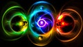 Three luminous emblems with different colors . The three main types of energy in the universe are electric, magnetic and