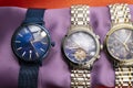 Three luxury sport Matteo Ferari male watches on bronze background