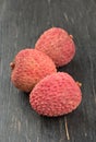 Three lychee fruits