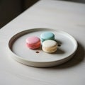 Three macarons are placed on a Royalty Free Stock Photo