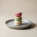 Three macarons stacked on a round Royalty Free Stock Photo