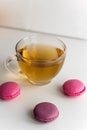 Three macarons and tea cup Royalty Free Stock Photo