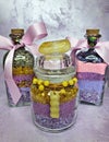 Magic jar with dreams, glitter, crystals, purple stones and lavender