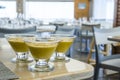 Three mango mousses in glass bowls Royalty Free Stock Photo