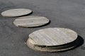 Three Manhole Covers Royalty Free Stock Photo