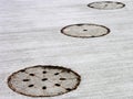 Three manholes 2 Royalty Free Stock Photo